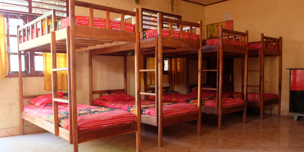 Row of bunk beds in an orphanage