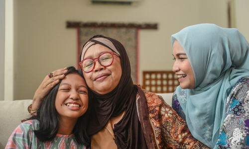 Mother and two daughters in Indonesia
