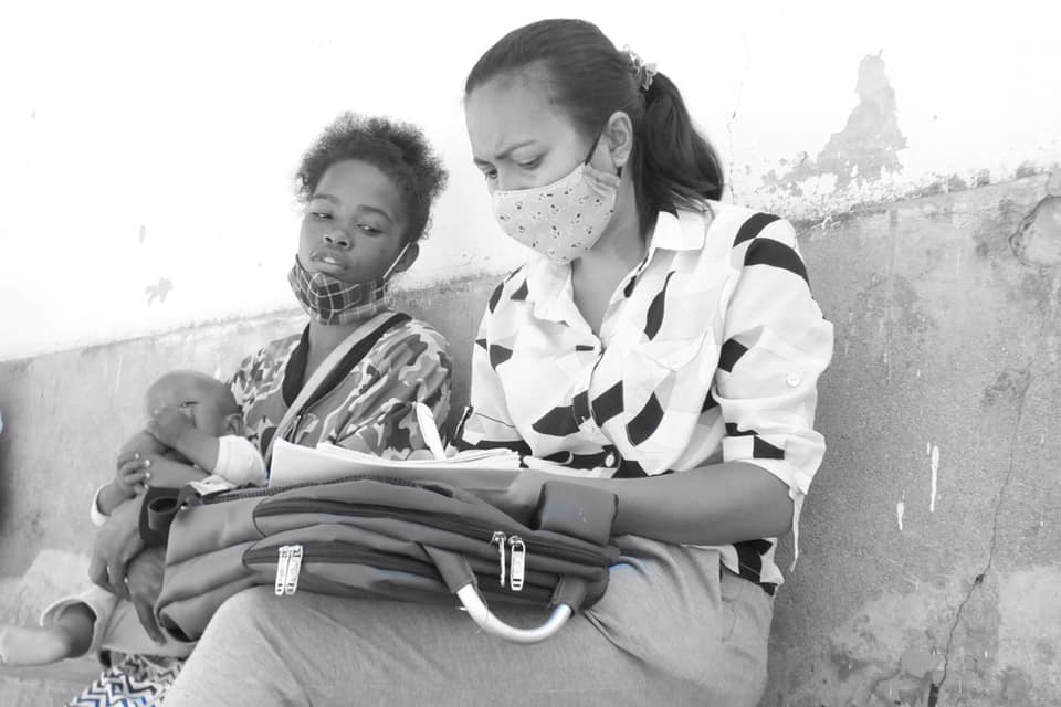 Social worker with a mom and baby in Madagascar