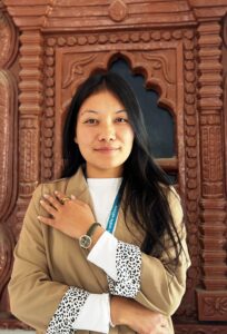 Bina a Reintegration Officer at The Himalayan Innovative Society in Nepal posing for a photo