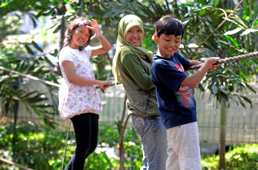 Some young climbers rope in the garden city of Surabaya, East Java