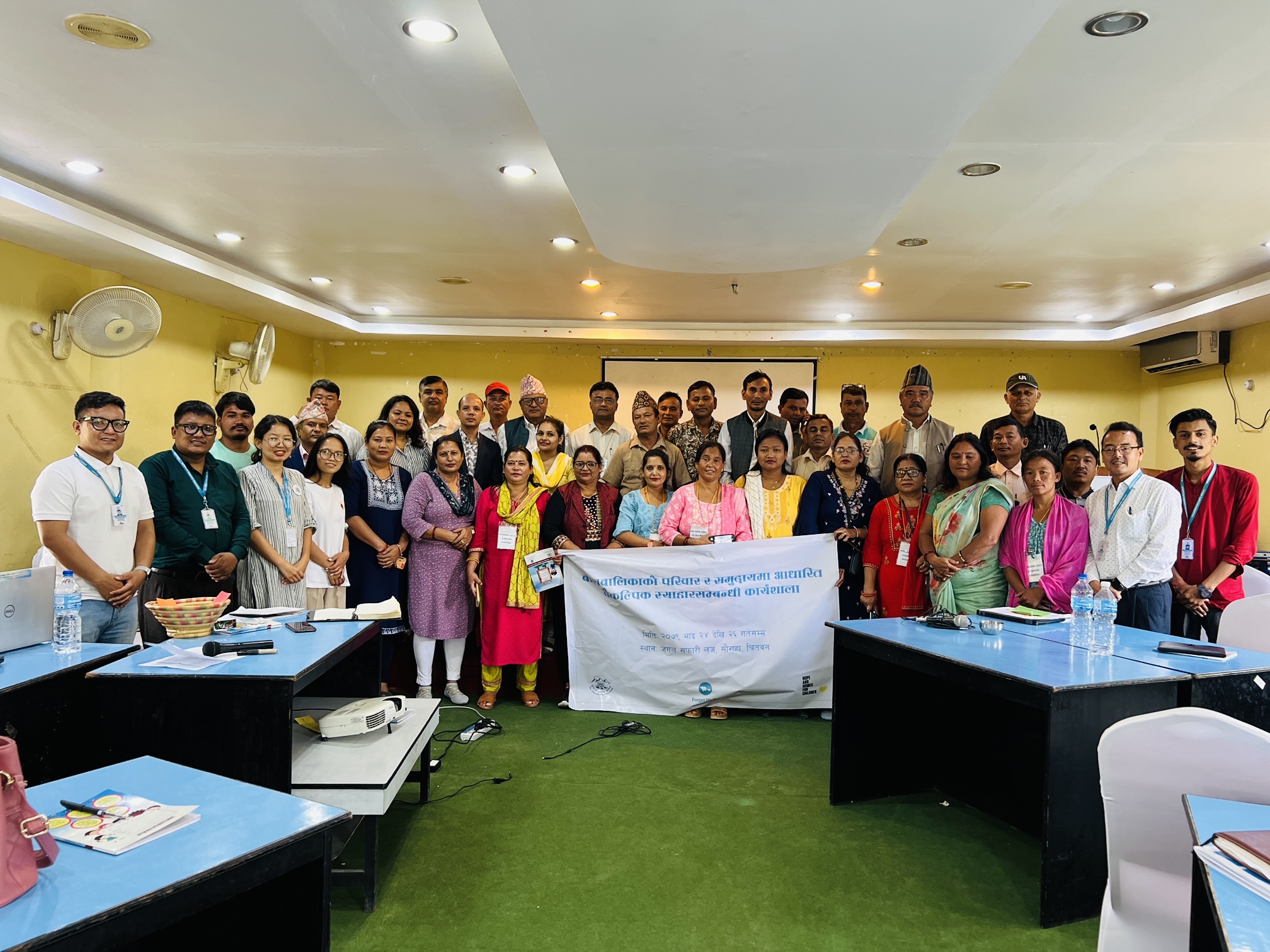 Group of leaders from municipalities in Nepal attending foster care training