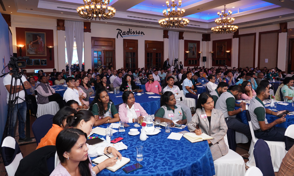 Wide shot of room of attendees at BICON 2023